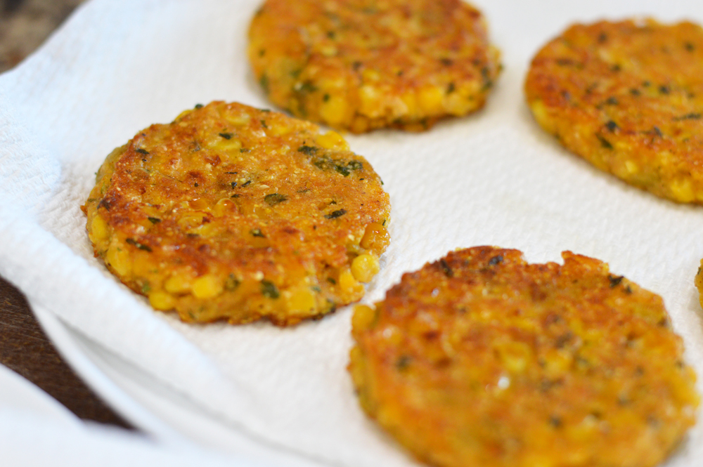 Draining Vegan Corn Fritters on Paper Towels