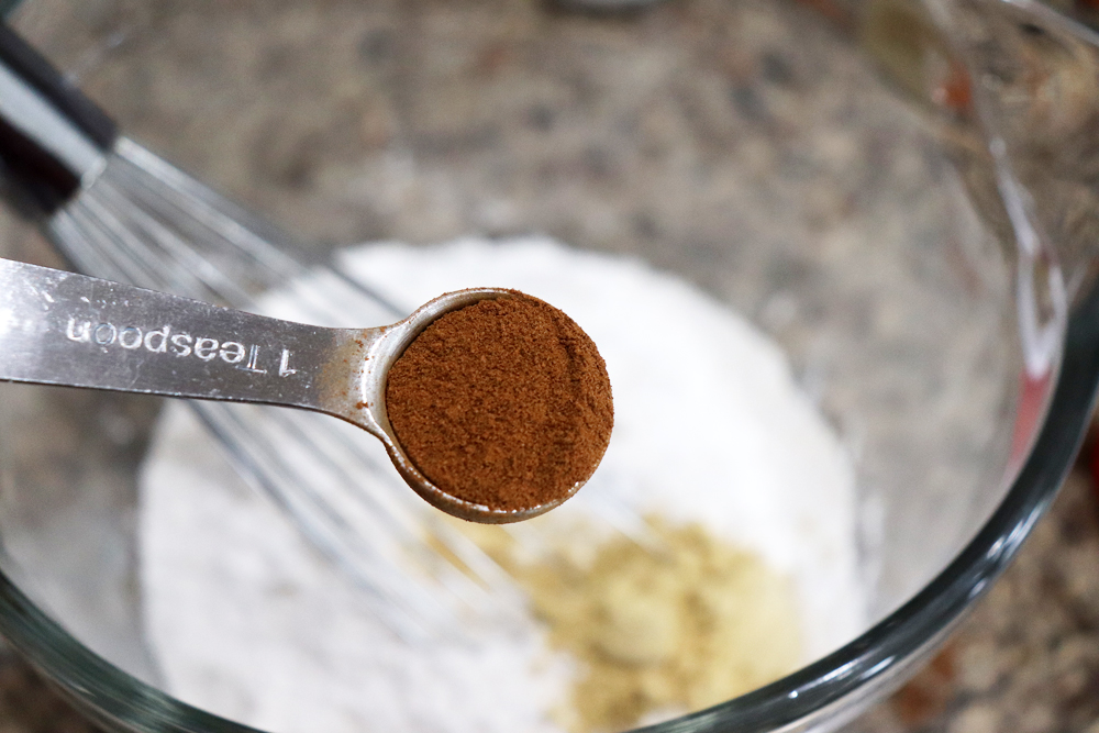 Adding cinnamon to the flour mixture