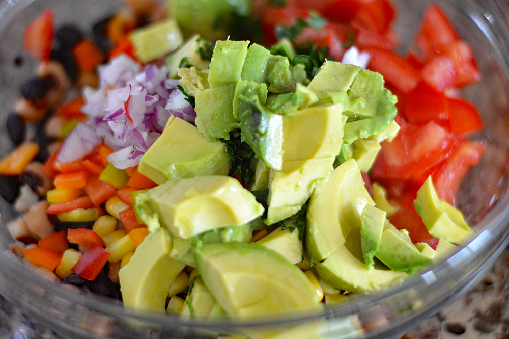 Adding avocadoes to Cowboy Caviar a/k/a "Texas Caviar"