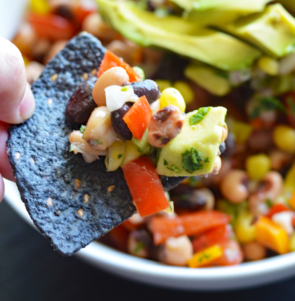 Blue Corn Tortilla Chip full of Cowboy Caviar a/k/a "Texas Caviar"