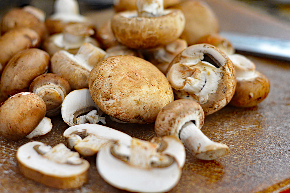 Slicing mushrooms for Vegan Mushroom Barley Soup