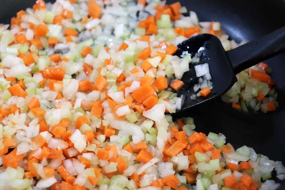 Diced onions, carrots and celery sauteeing