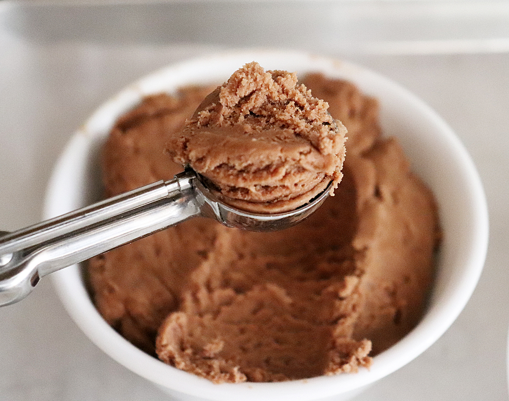 Scooping batter to make cookies