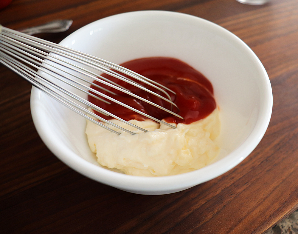 Whisking the dipping sauce for the Crispy Baked Avocado Fries