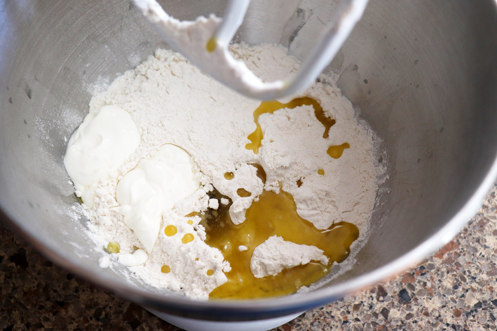 Adding ingredients to the mixing bowl