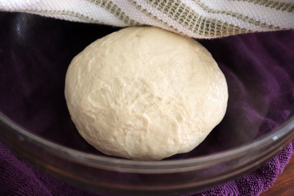 Setting the dough aside to rise