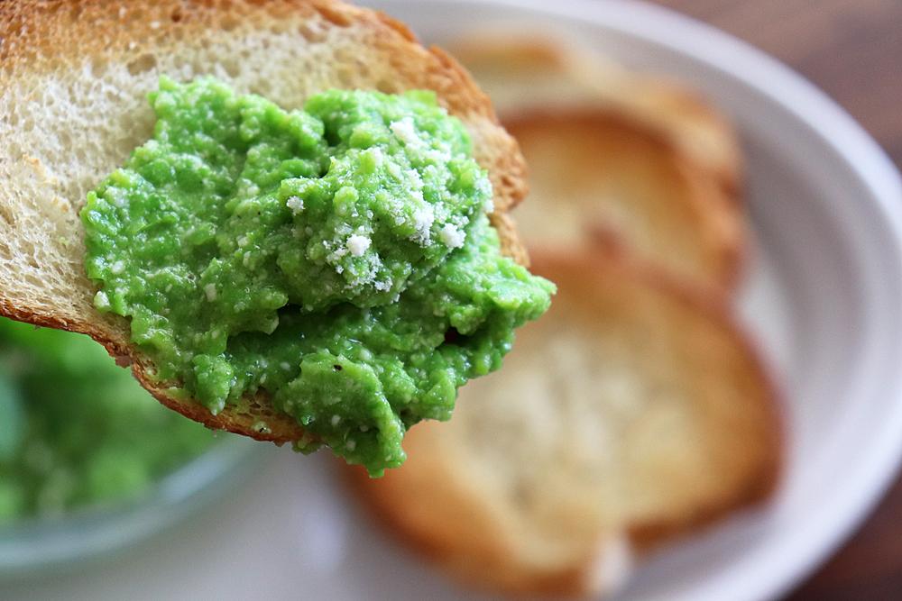 Bite shot of Pea Pesto Crostini Recipe