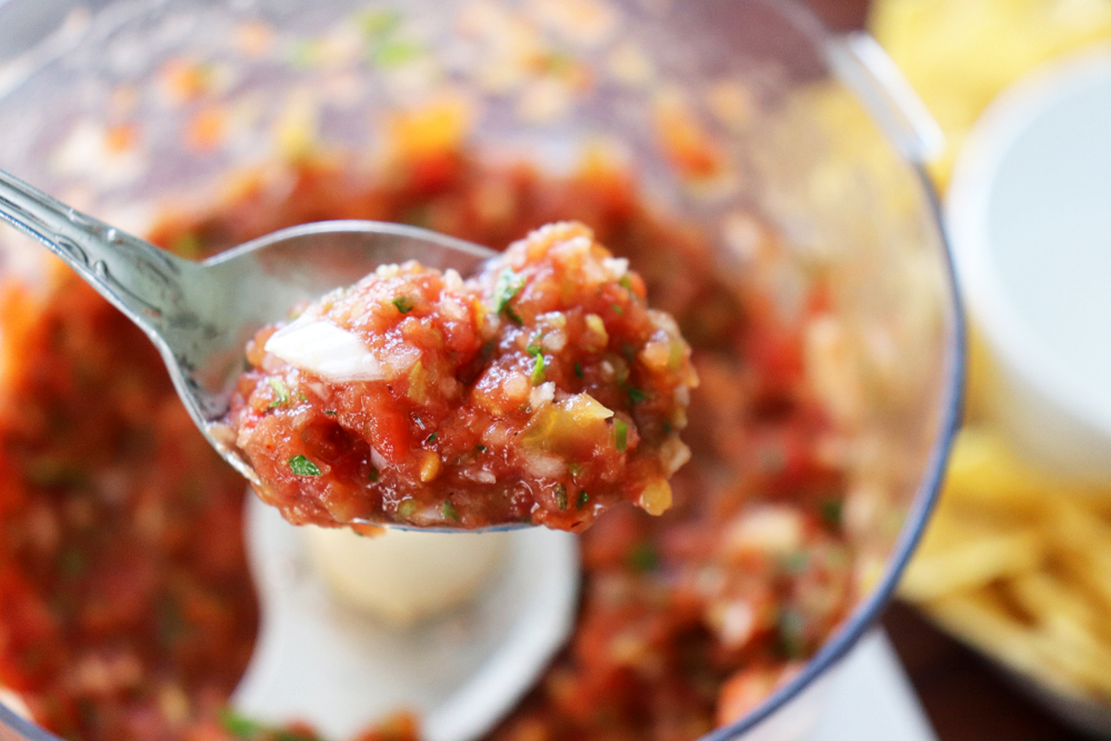 Spoon shot of blender salsa