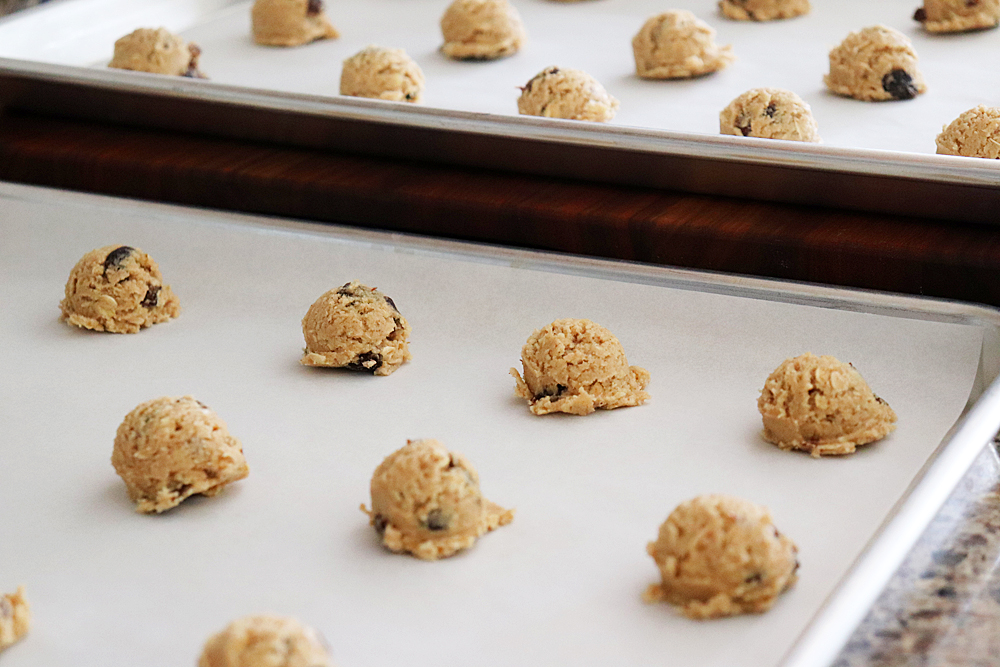 Small scoops of oatmeal raisin dough