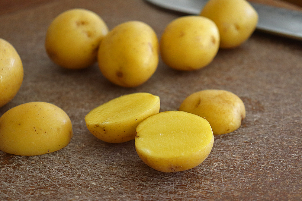 Cutting potatoes in half