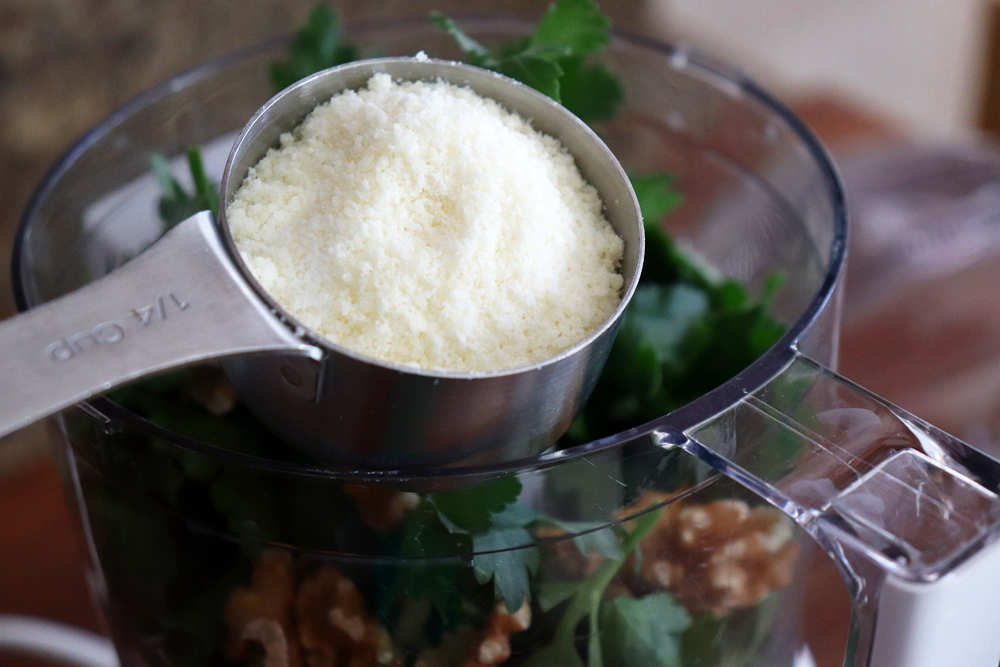 Adding ingredients to the food processor