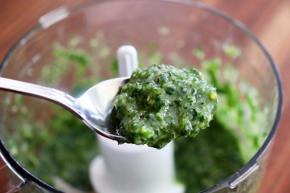 Spoon shot of finished parsley pesto