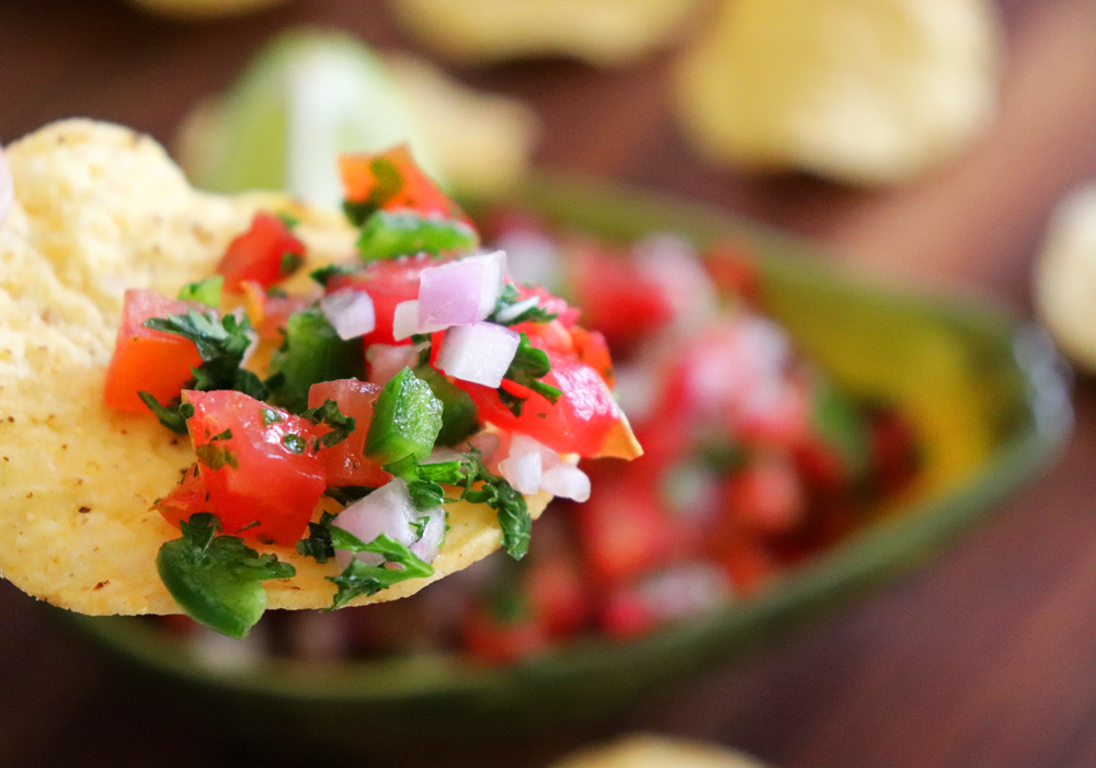 Bite shot of Classic Pico de Gallo Recipe