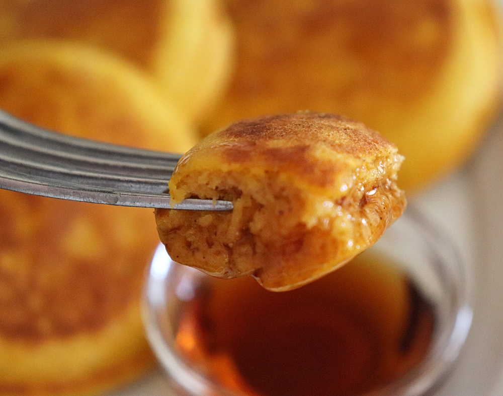 Bite shot of Quick and Easy Vegan Pumpkin Pancakes