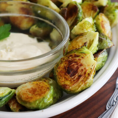 Close up of Roasted Brussels Sprouts with Lemon Aioli