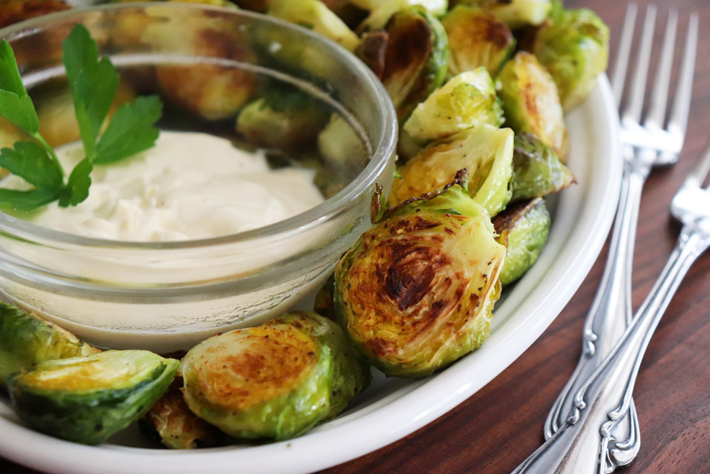 Close up of Roasted Brussels Sprouts with Lemon Aioli