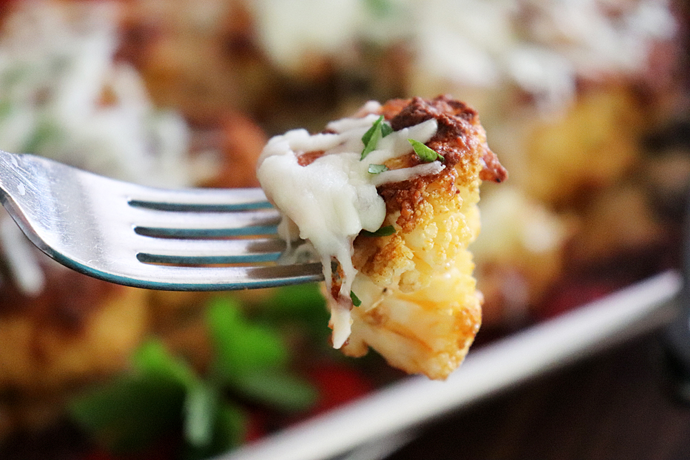 Bite shot of Easy Cheesy Cauliflower Steaks Recipe