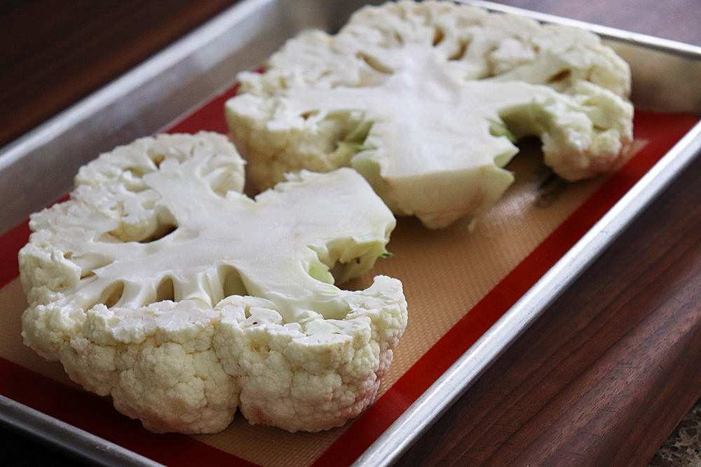 Place cauliflower on a lined baking sheet