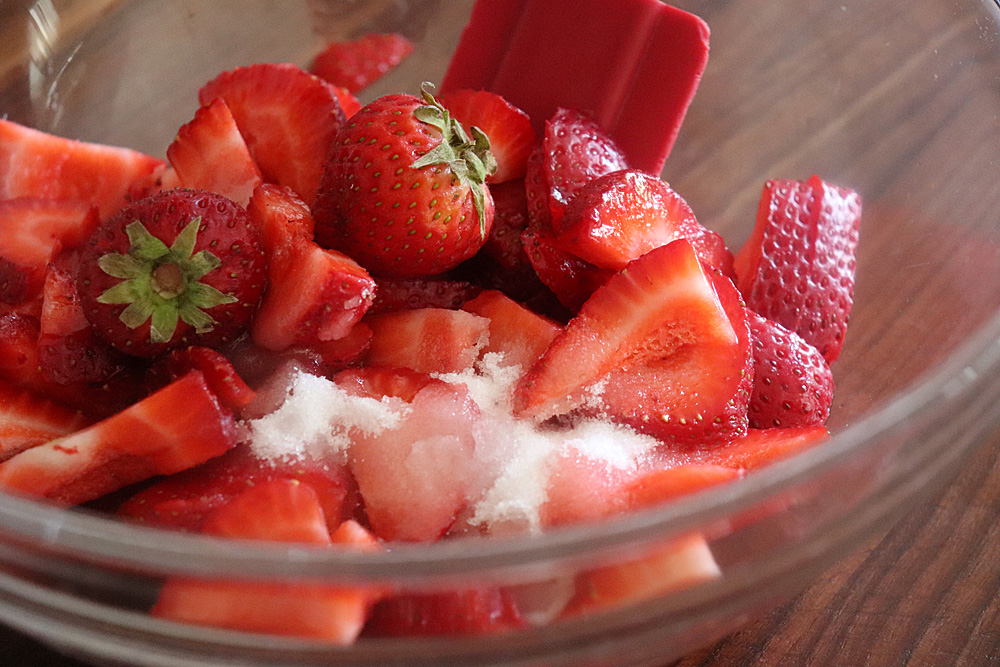 Add sugar, lemon juice and a pinch of salt for Easy Macerated Strawberries with Sugar 