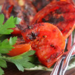 Plated Grilled Tomatoes with Italian Herbs