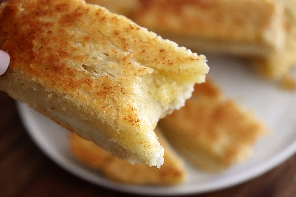 Bite shot of Katie's Stovetop Garlic Bread